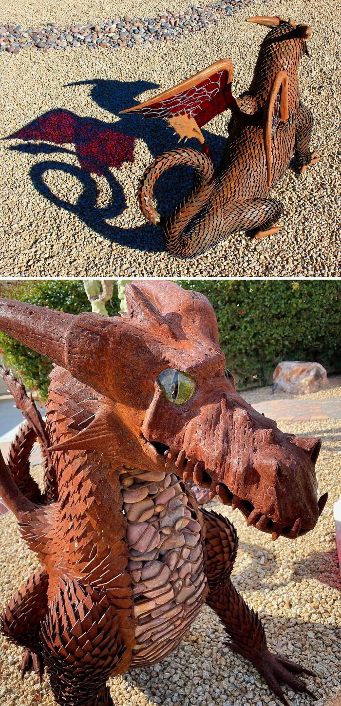 Metalworkers crafted a detailed dragon sculpture with intricate scales and wings, showcasing remarkable metalworking skills.