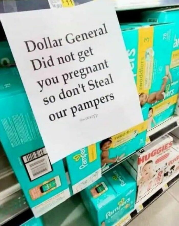 Sign in a store warning customers not to steal pampers with a humorous and strange message on display.