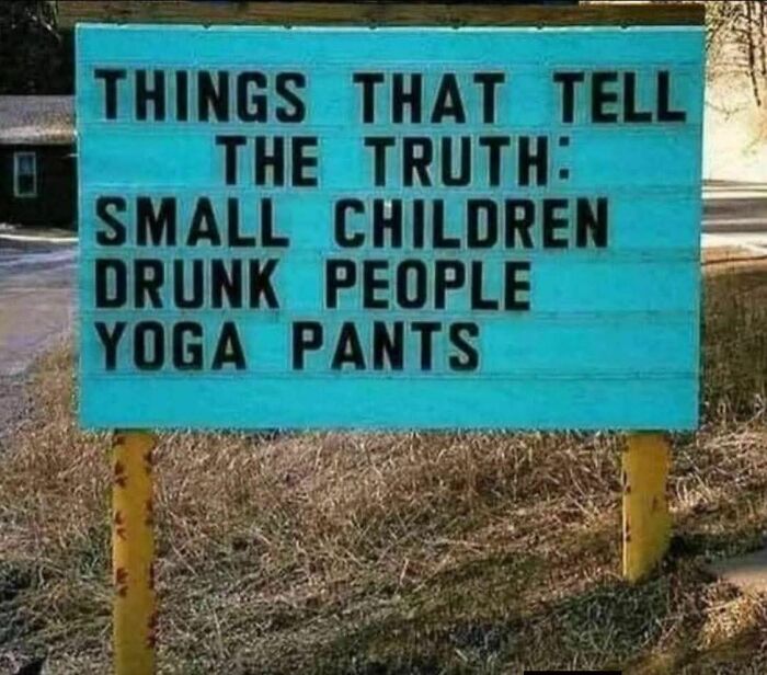 Funny strange sign outdoors listing small children, drunk people, and yoga pants as things that tell the truth.