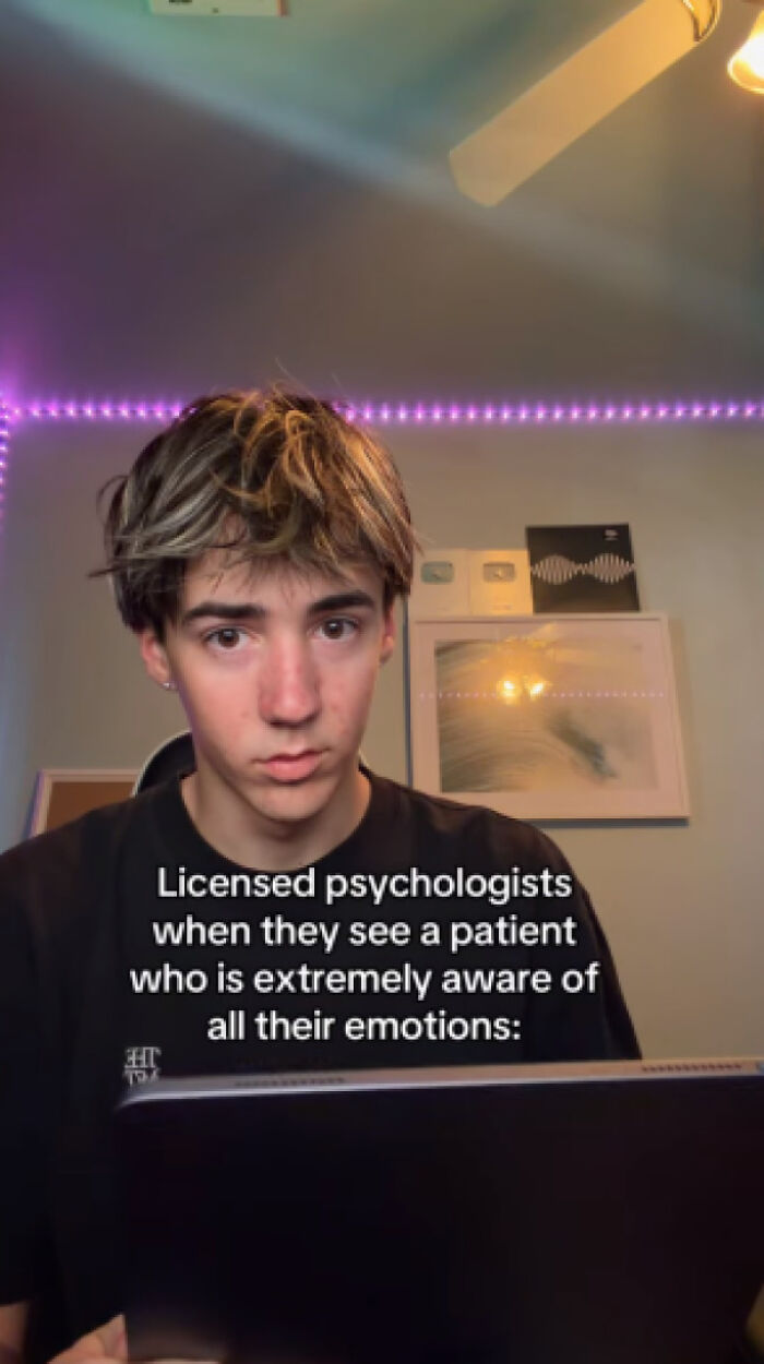 A young man with text overlay, portraying a licensed psychologist needing to explain the joke about emotional awareness.