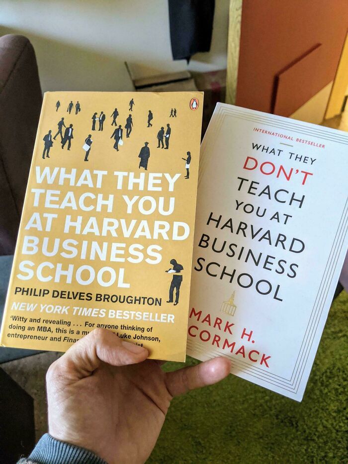 Two books titled What They Teach You At Harvard Business School and What They Dont Teach You At Harvard Business School, highlighting online lies.