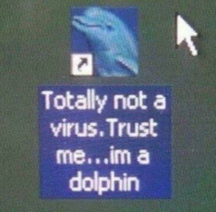 A pop-up window showing a dolphin icon and text 'Totally not a virus. Trust me...im a dolphin,' illustrating online lies.