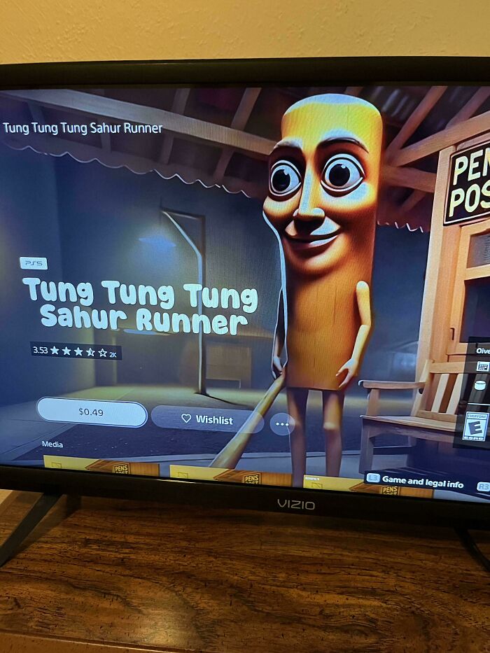 Animation character with large eyes holding a bat in a video game screen, one of the strange pics that people had to take.