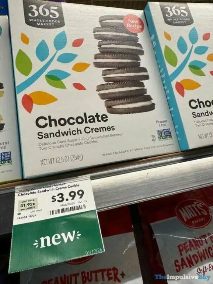 Box of 365 Whole Foods Market chocolate sandwich cremes showing shrinkflation with smaller cookie size and $3.99 price tag.