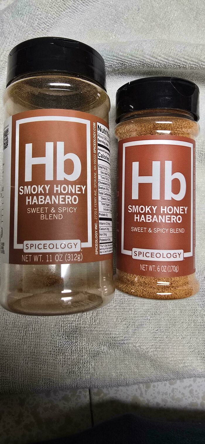 Two Spiceology smoky honey habanero spice jars, showing shrinkflation with different container sizes and weights.