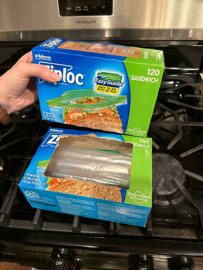 Two Ziploc sandwich bag boxes showing obvious shrinkflation with reduced bag quantity on a kitchen stove.