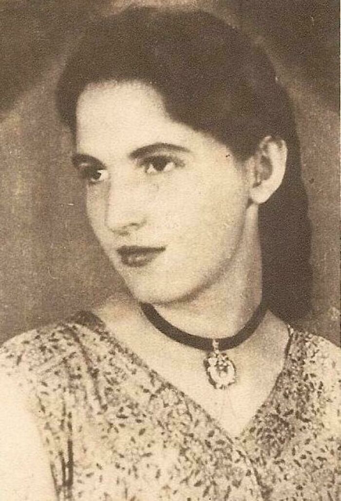 Vintage portrait of a woman from decades ago, capturing timeless emotions in historic photos that still resonate today.