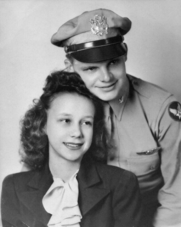 Vintage photo of a smiling military officer and woman, capturing moments from decades ago for nostalgic appeal.