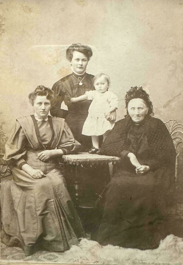 Vintage family portrait from decades ago showing four generations, highlighting the power of photos from decades ago.