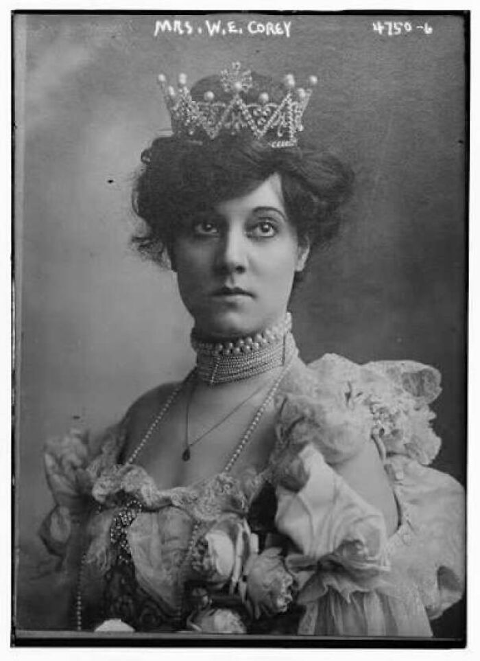 Vintage portrait of a woman wearing an ornate crown and Victorian-era dress from photos decades ago.