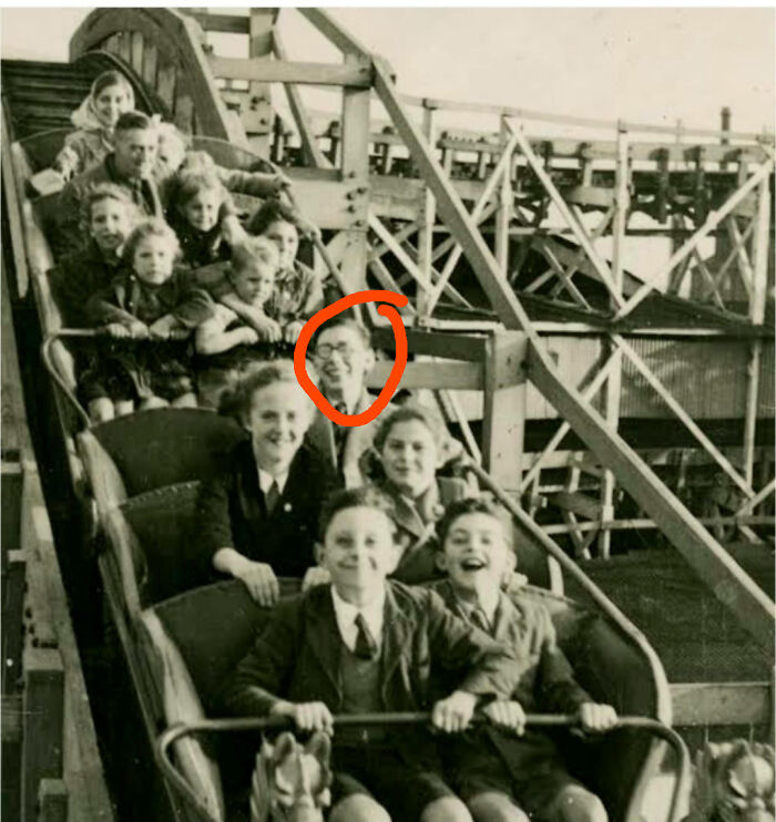Group of children on a vintage roller coaster ride, captured in one of the photos from decades ago that still speak louder today.