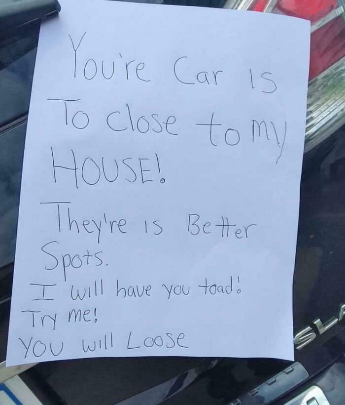 A handwritten note on a car, an example of unbelievable entitlement from a demanding neighbor.