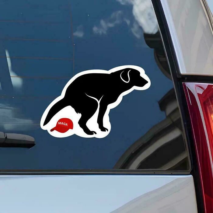 Sticker of a black dog squatting with a red MAGA hat graphic on a car window, showcasing hilarious and unhinged bumper stickers.