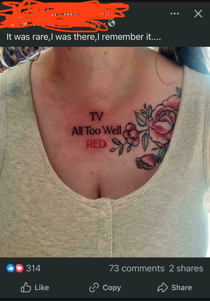 Tattoo on chest with the words TV All Too Well RED and a floral design, an example of truly awful tattoos.