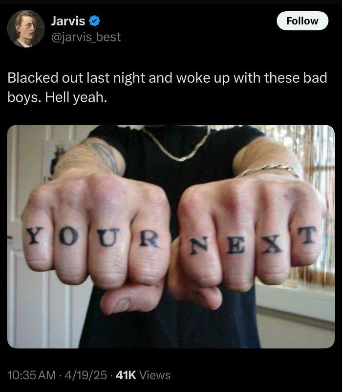 Fingers tattooed with the words YOUR NEXT, showcasing a truly awful tattoo with a bold, permanent message.