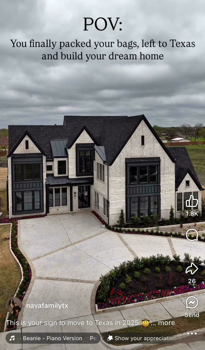 An elegant mansion with a dark roof and light brickwork, reflecting modern dream home inspiration.