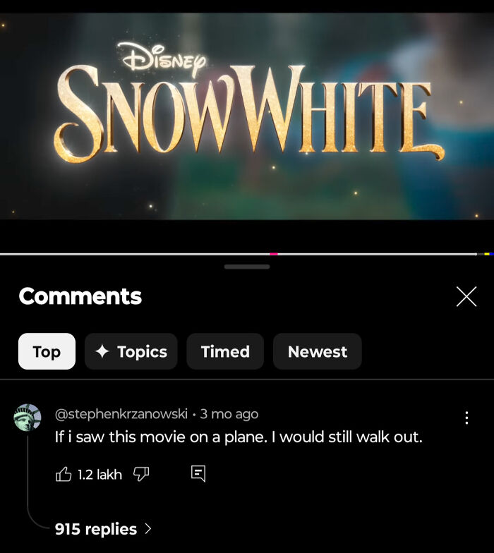 A comment section on a Disney Snow White trailer, showing a savage verbal knockout remark about walking out on the movie.
