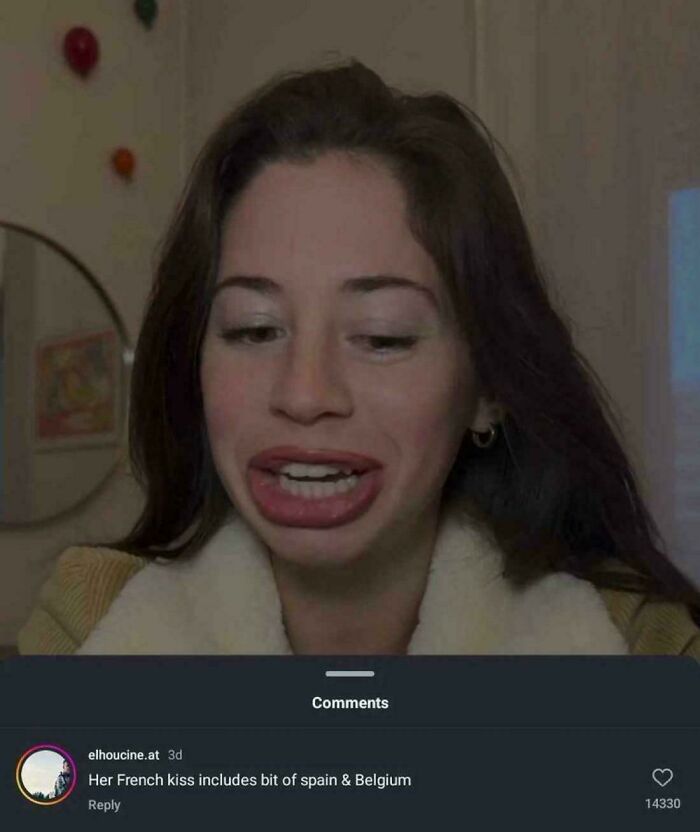 A woman with an exaggerated facial expression and a comment below about her French kiss, highlighting a savage verbal knockout.