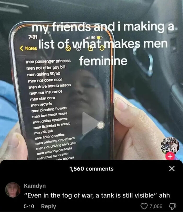 A phone displaying a list of what makes men feminine, with a comment saying, Even in the fog of war, a tank is still visible ahh, a verbal knockout.