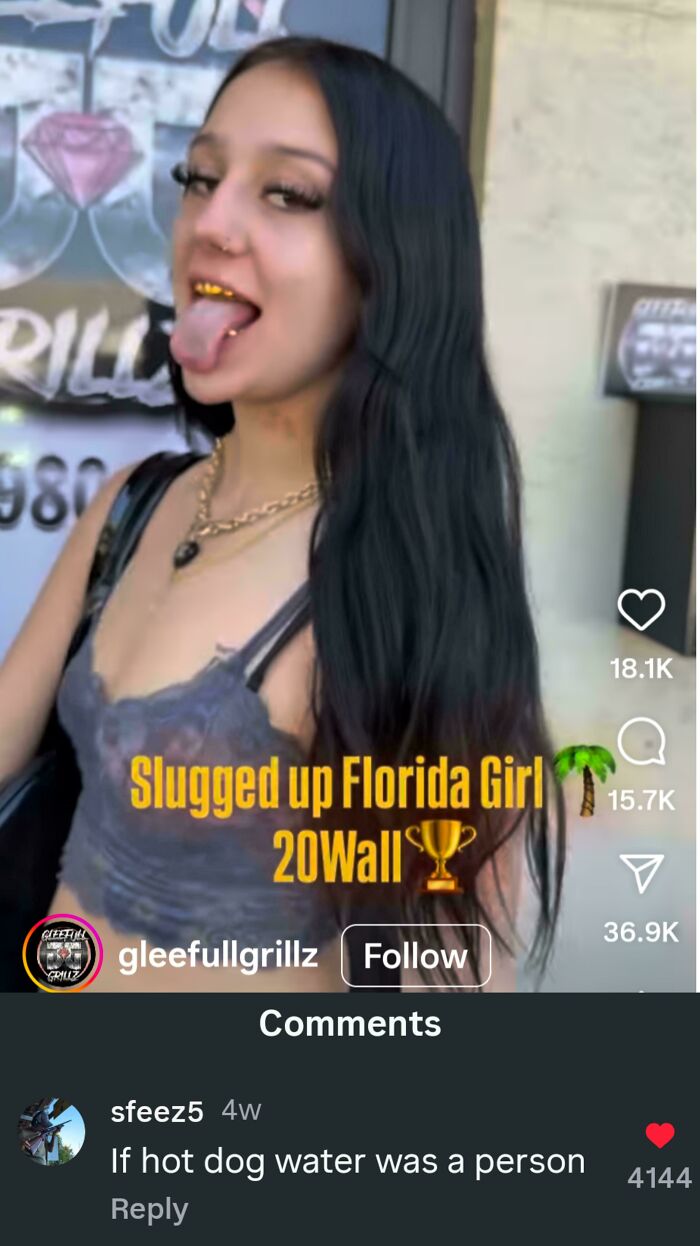 A woman with long dark hair and gold teeth, showing a verbal knockout so savage, there was no coming back.