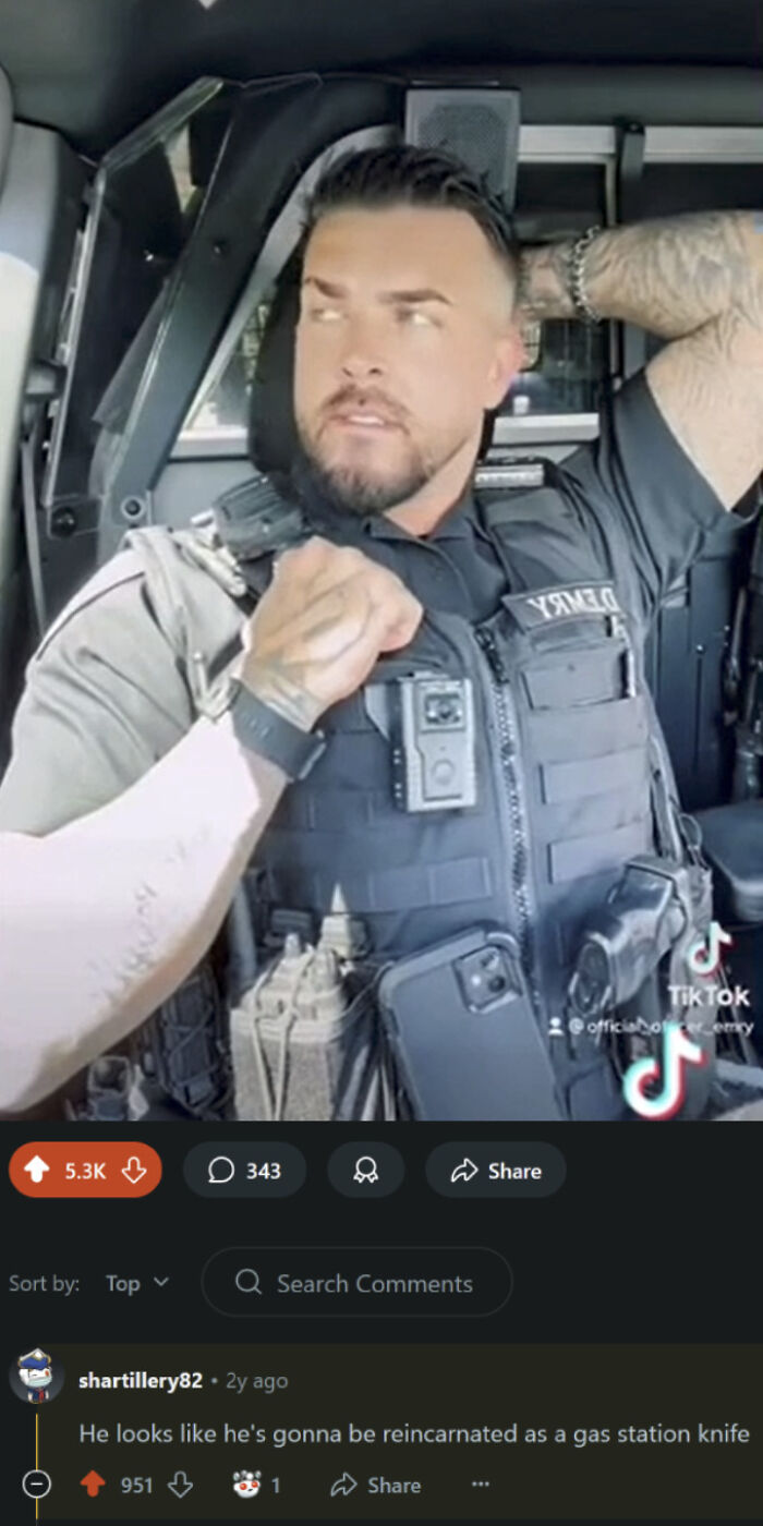 A muscular police officer in uniform looking upwards, an example of a verbal knockout so savage, there was no coming back.