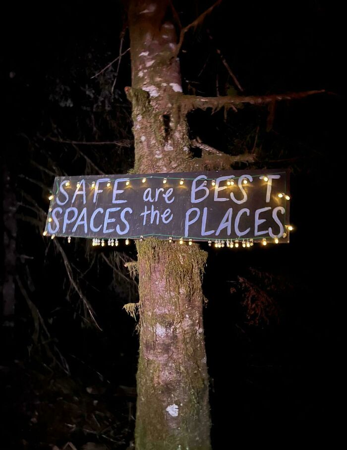 A hilariously confusing message from poor sign design with a sign on a tree that reads 'SAFE ARE BEST SPACES THE PLACES.'