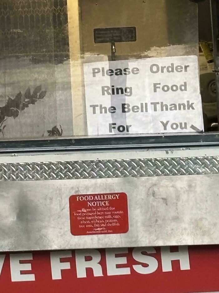 A hilariously confusing message on a sign reads 'Please Order Ring Food The Bell Thank For You'.