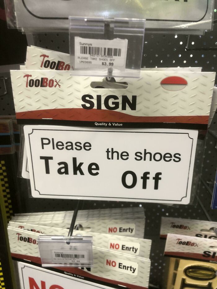 A hilariously confusing sign design that reads Please Take The Shoes Off, an example of poor sign design.