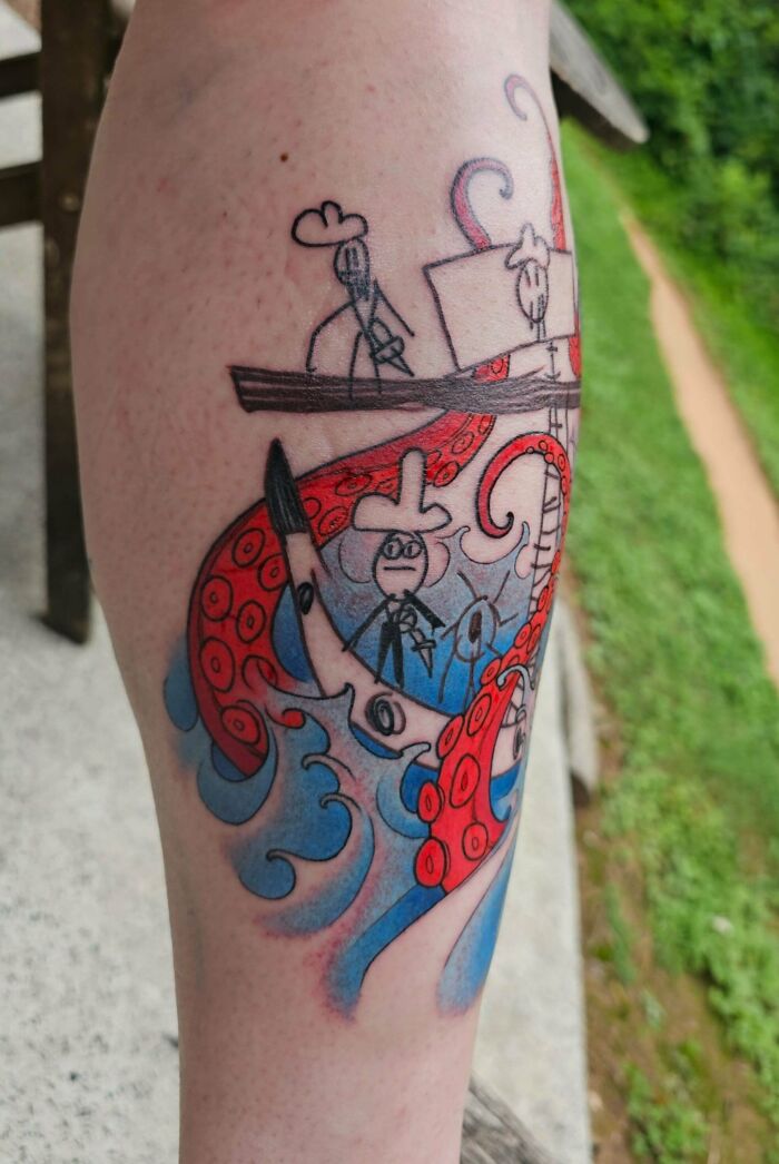 A whimsical, colorful tattoo on a leg depicting stick figures on a boat battling a giant octopus. This stunning tattoo is a permanent design.