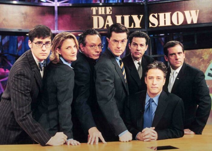 A nostalgic '90s cast photo of The Daily Show, a group of presenters from that era.