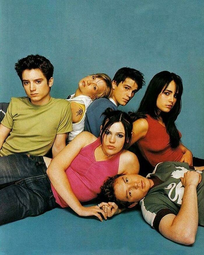 A group of diverse young '90s kid actors posing, capturing the nostalgic essence of the era in a meme.