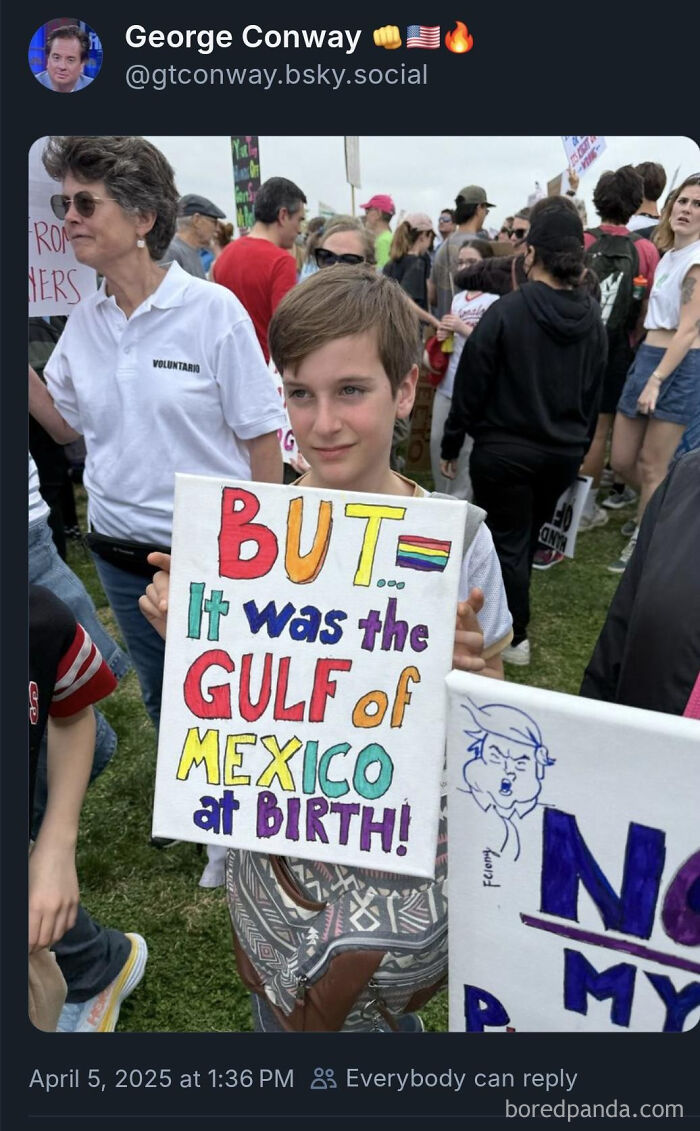 An ironic response to a nonsensical post, a boy holding a sign about the Gulf of Mexico at birth.