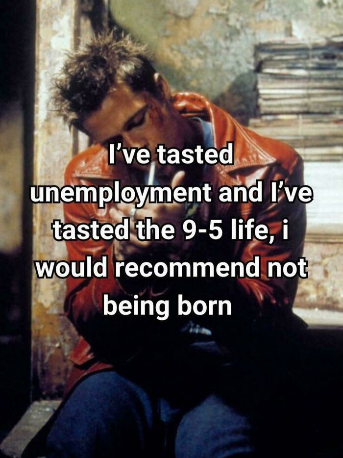 Man in a worn red leather jacket lighting a cigarette with a meme about unemployment and 9-5 life hitting close to home.