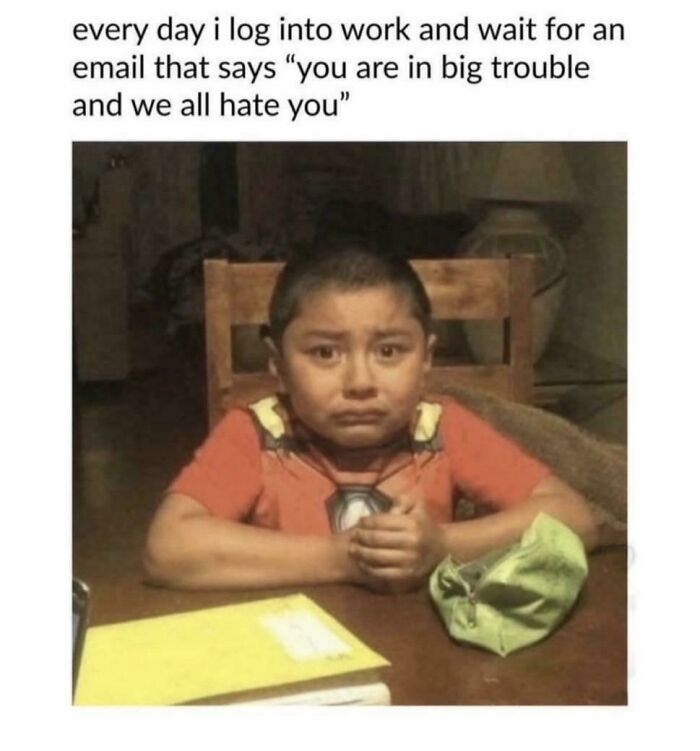 Child in a red shirt sitting at a table, looking anxious and nervous, capturing relatable life moments meme.