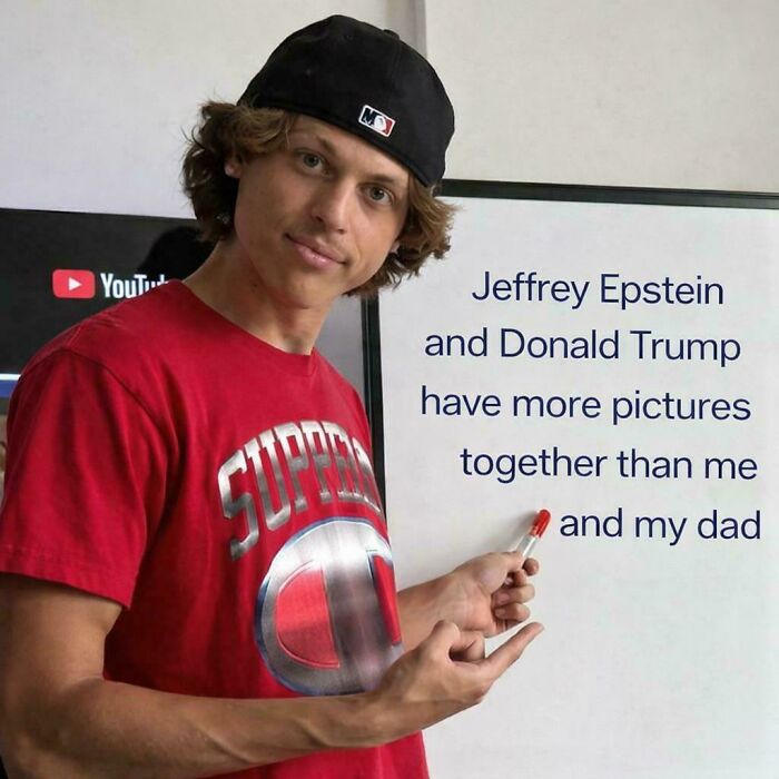 Young man in a Supreme shirt holding a marker, presenting a relatable meme about pictures that hit a little too close to home.