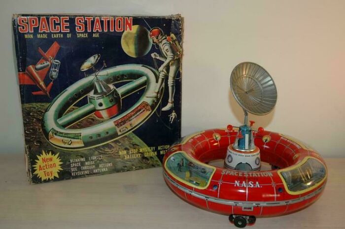 Retrofuturism vintage NASA space station toy with spinning antenna and box