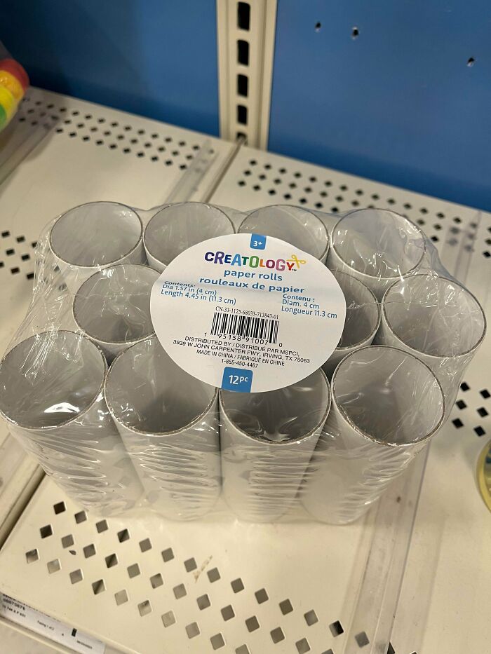 A package of paper rolls, illustrating consumerism and its 400% price difference.