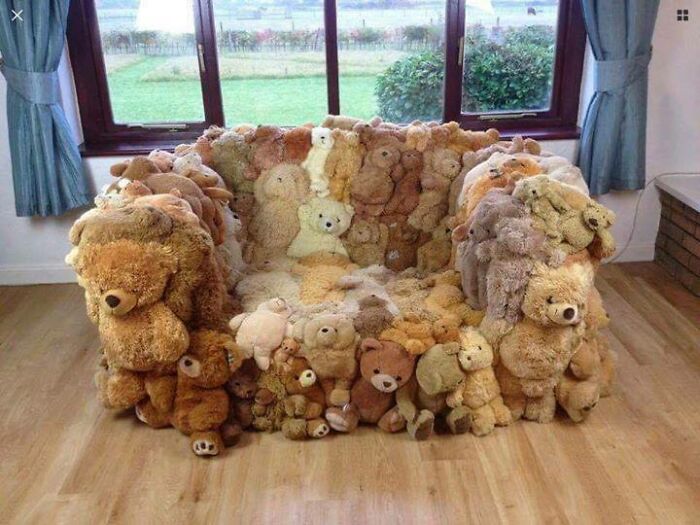 Armchair made entirely of stuffed teddy bears, a ridiculous piece of furniture discovered and shared online.