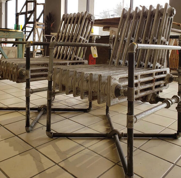 Industrial-style chair made from old radiators and metal pipes, a unique example of ridiculous furniture design.