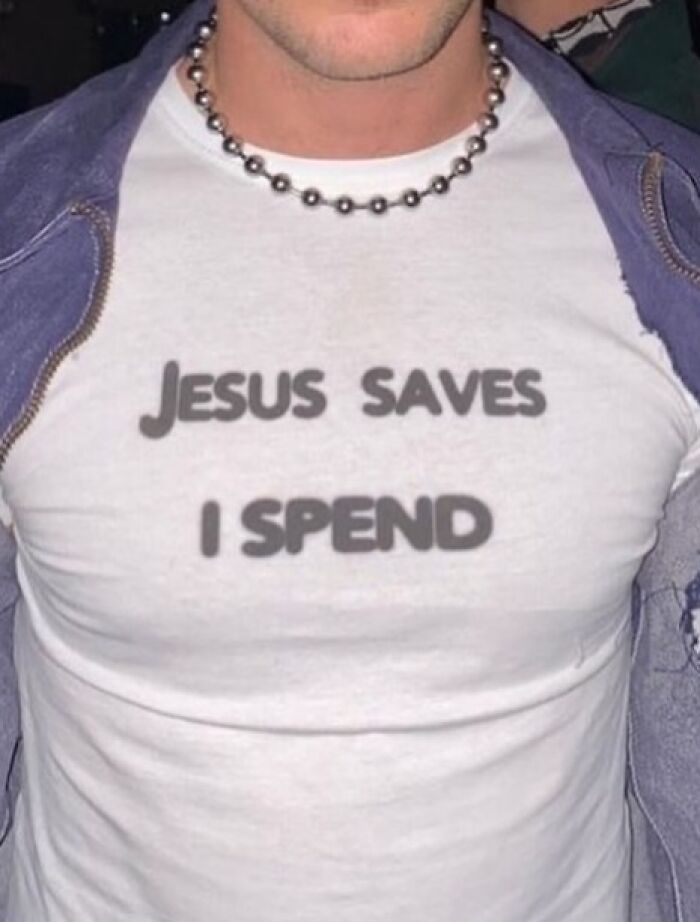 Man wearing a white shirt with funny text and a beaded necklace, a weirdly hilarious image to improve your feed and mood