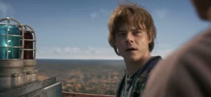 A young man on a rooftop looking surprised, illustrating hilariously absurd movie and TV details made up yet accurate.