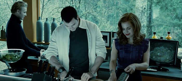 Three characters in a movie kitchen scene preparing food, illustrating hilariously absurd movie and TV details.