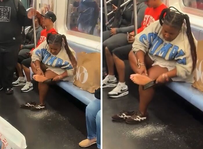 Person sitting on a NYC subway seat with shoes off, sprinkling powder on the floor in a weird subway moment.