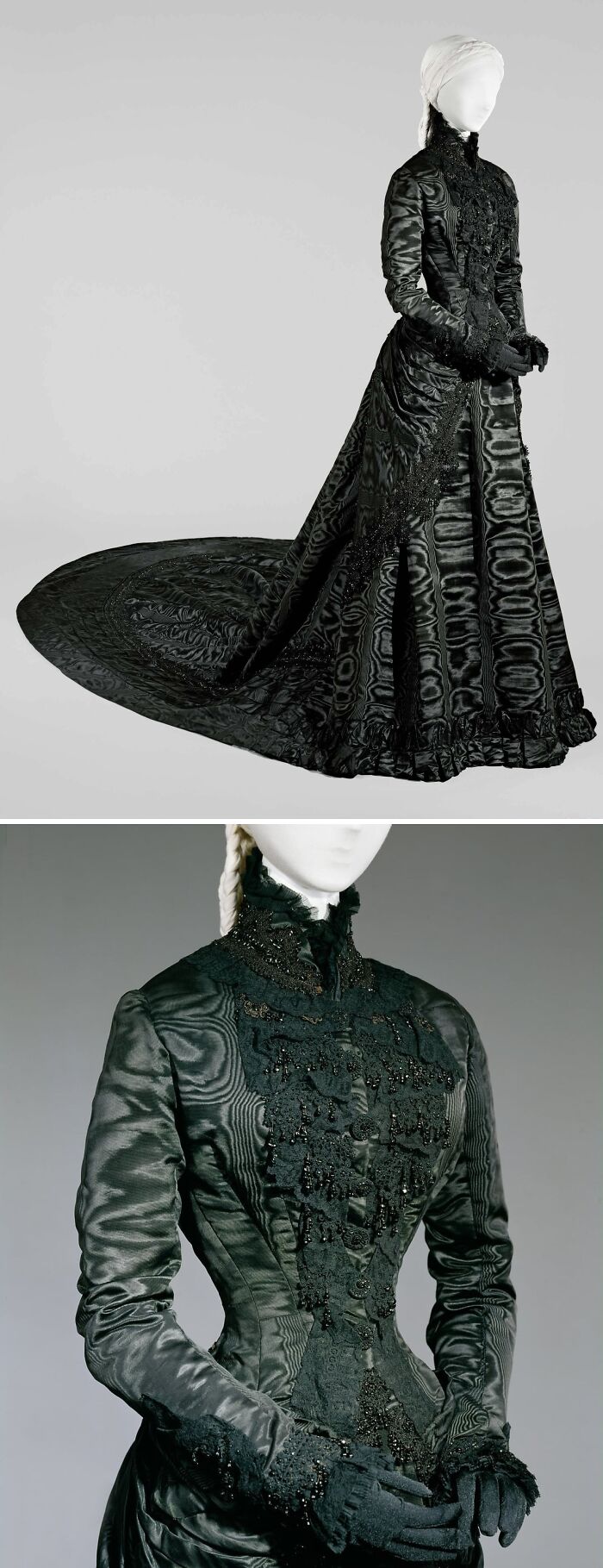 Victorian-style historical garment in black silk with intricate beading and a long train, showcasing vintage fashion details.