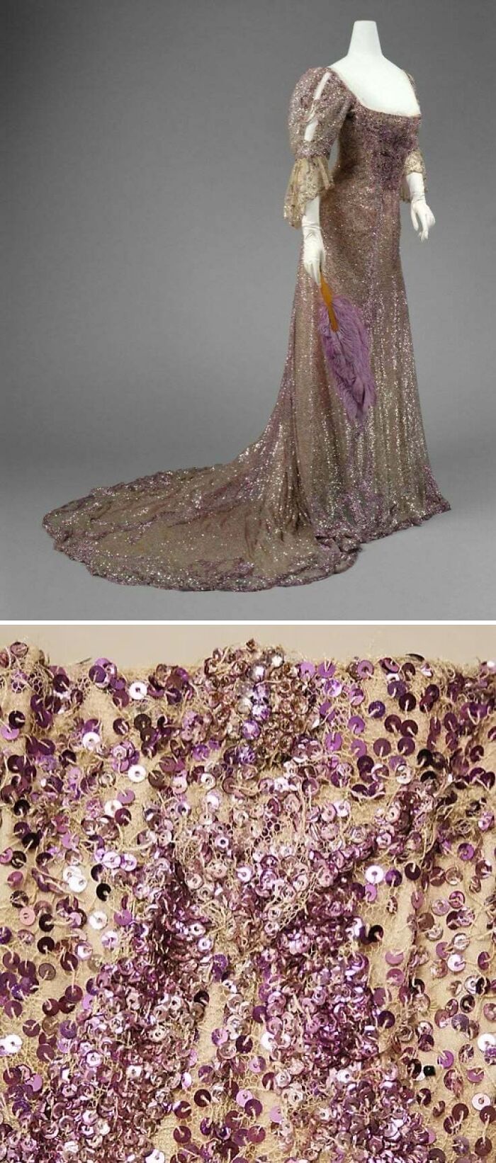 Sparkling historical garment with intricate purple sequins and flowing train displayed on mannequin with purple feather fan.