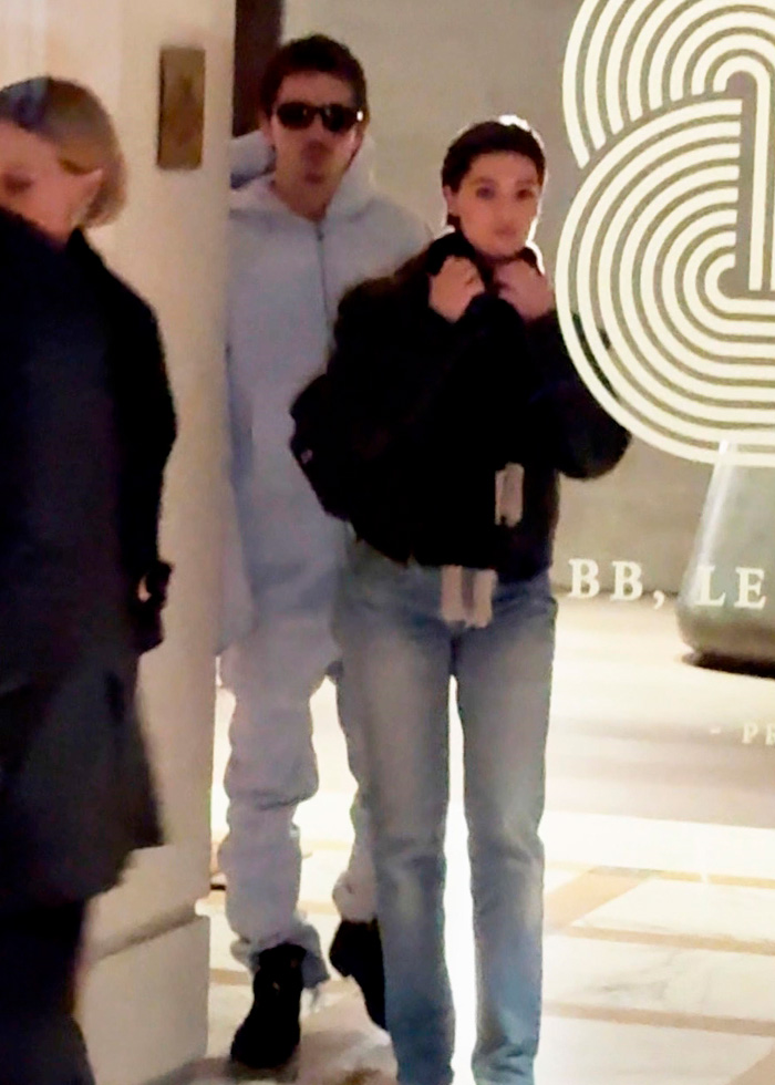 Timoth&eacute;e Chalamet and Anamaria Vartolomei leaving a hotel, sparking conspiracy theories about their appearance together.