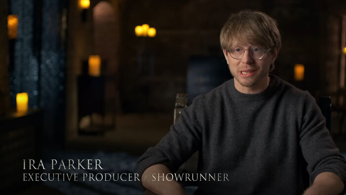 Ira Parker, executive producer and showrunner, speaking about A Knight Of The Seven Kingdoms finale in a dimly lit room. Ira Parker, executive producer and showrunner, speaking about A Knight Of The Seven Kingdoms finale in a dimly lit room.