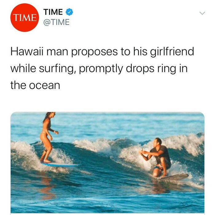Tweet from TIME about a Hawaii man proposing while surfing and accidentally dropping the ring in ocean, showcasing unhinged news headlines.