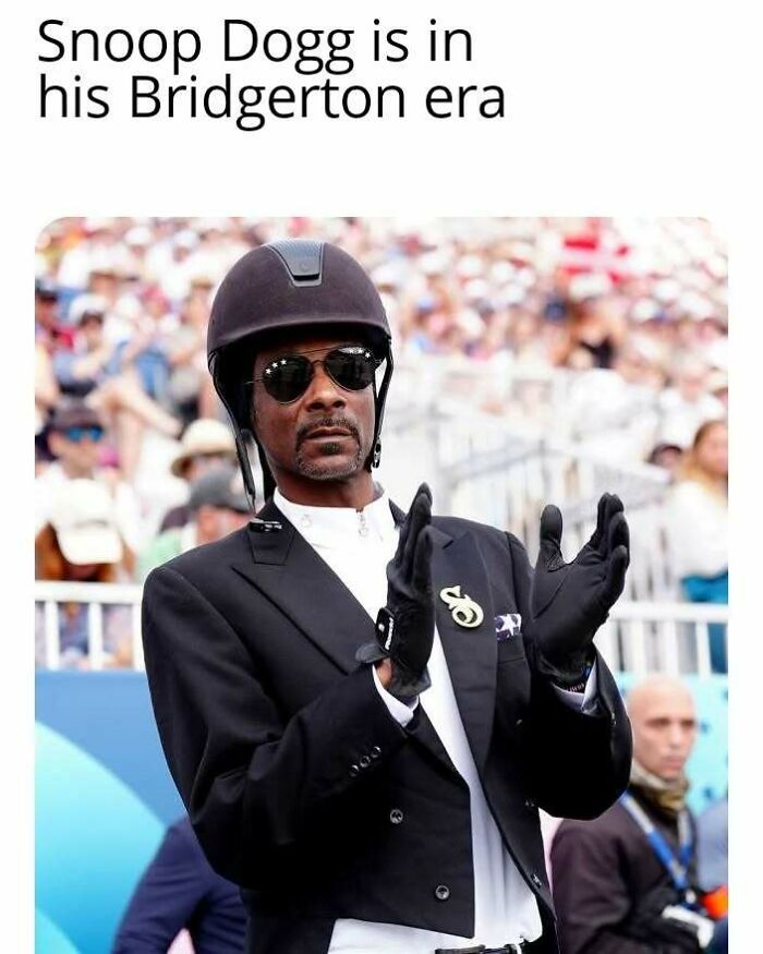 Snoop Dogg wearing equestrian attire and sunglasses, clapping with a crowd in the background in a Bridgerton meme.