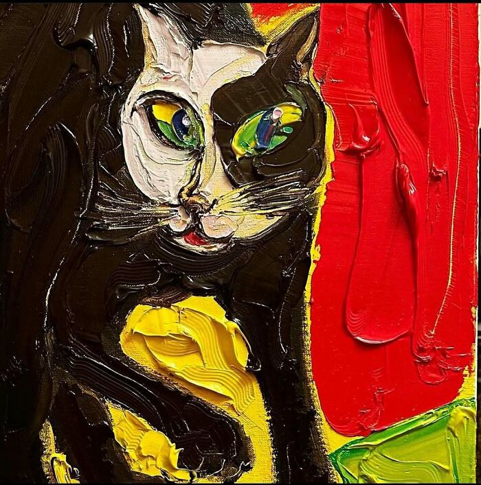 Thick oil painting of a cat with green eyes on vibrant red and yellow background, showcasing cats as favorite art subjects.